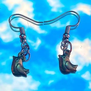 Earrings are delicate and handmade. They are a nice Silver color.